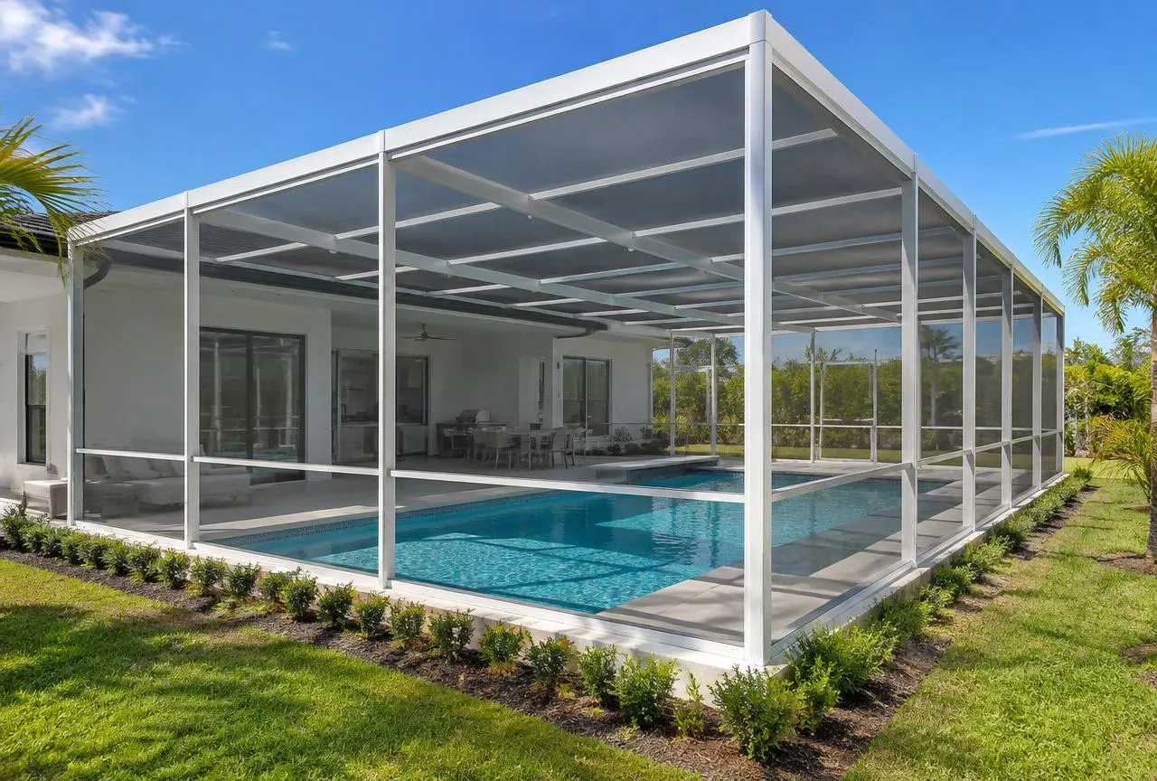 Tall flat-roof pool screen enclosure surrounding a rectangular pool